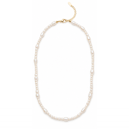 A delicate pearl necklace with irregular white pearls and gold-toned metal findings, including a clasp and extender chain, displayed on a clean white background.